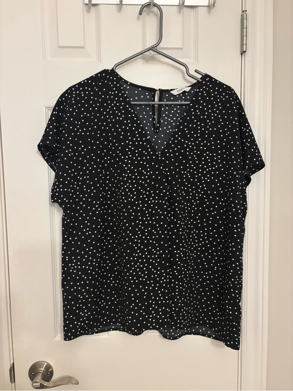 Ricki's Black and White Polka Dot V-Neck Blouse